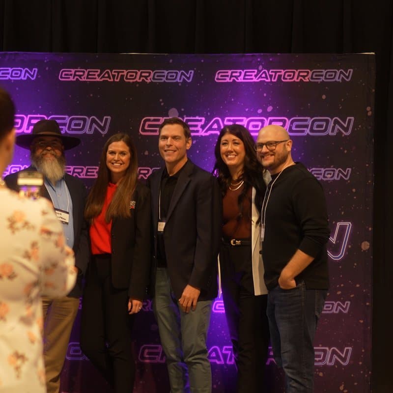 Group photo at the CreatorCon backdrop