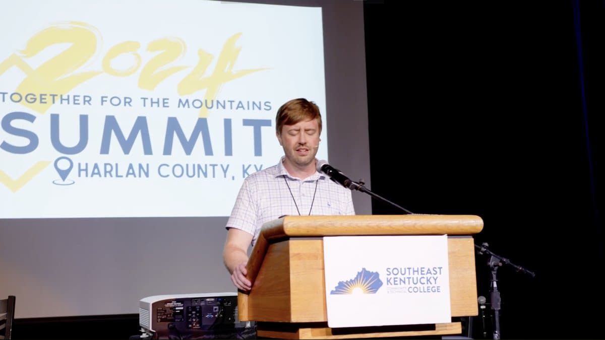 Together for the Mountains Summit — speaker at the podium
